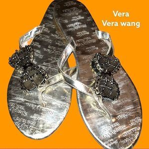 Vera Vera wang gold thong sandals with cute bow on the side strap!
